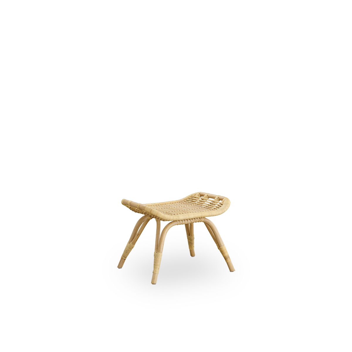 Side view of Monet footstool in natural rattan handcrafted from high-quality Indonesian rattan.