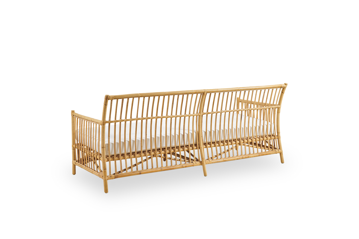Plain back view of Caroline 3-seater wicker sofa, simple and elegant Danish design. Handcrafted from Indonesian rattan with detailed woven accents for a cozy, calming presence.