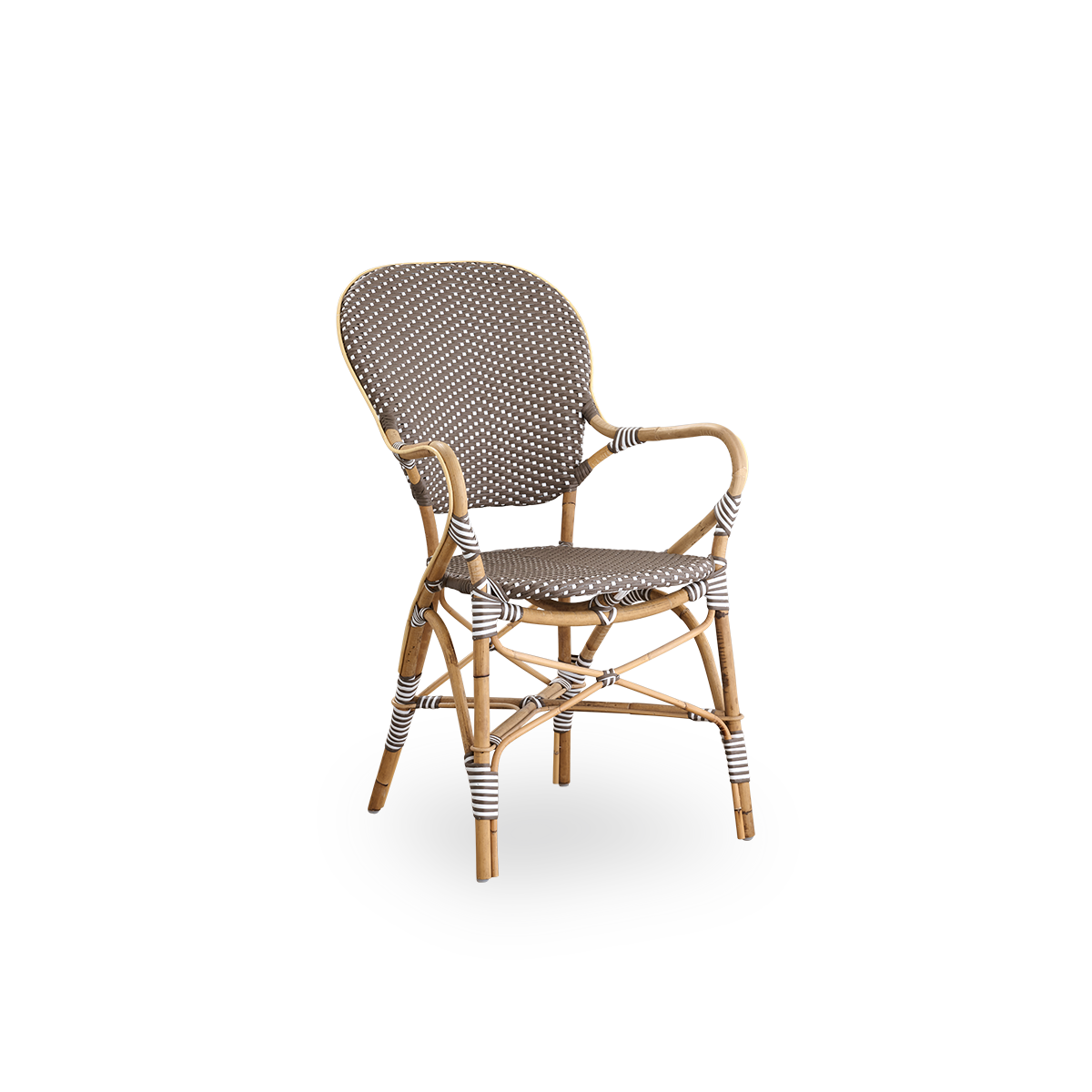 Side view of Isabell dining chair with armrest. Rattan frame with seat and backrest made in brown ArtFibre with white dots. Inspired by 1950s bistro design.