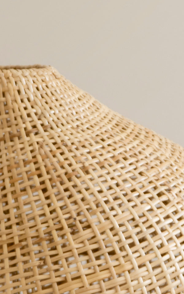 This is a close-up image of Figura Floor Lampshade in light natural weave rattan.