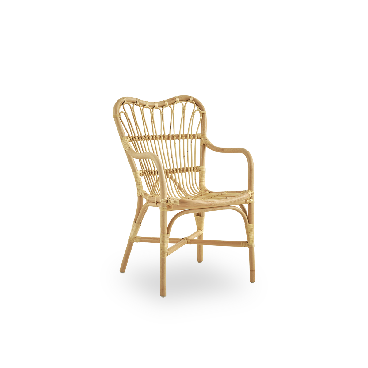 Side view of Margret dining chair with high wide backrest and curved armrests. Handcrafted from high-quality Indonesian rattan.