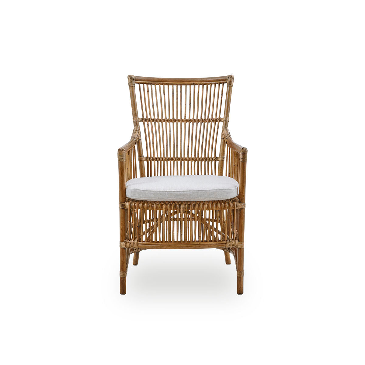 Front view of the Davinci dining chair in antique brown color. A wicker chair with armrests and a high back, handcrafted from high-quality Indonesian rattan.