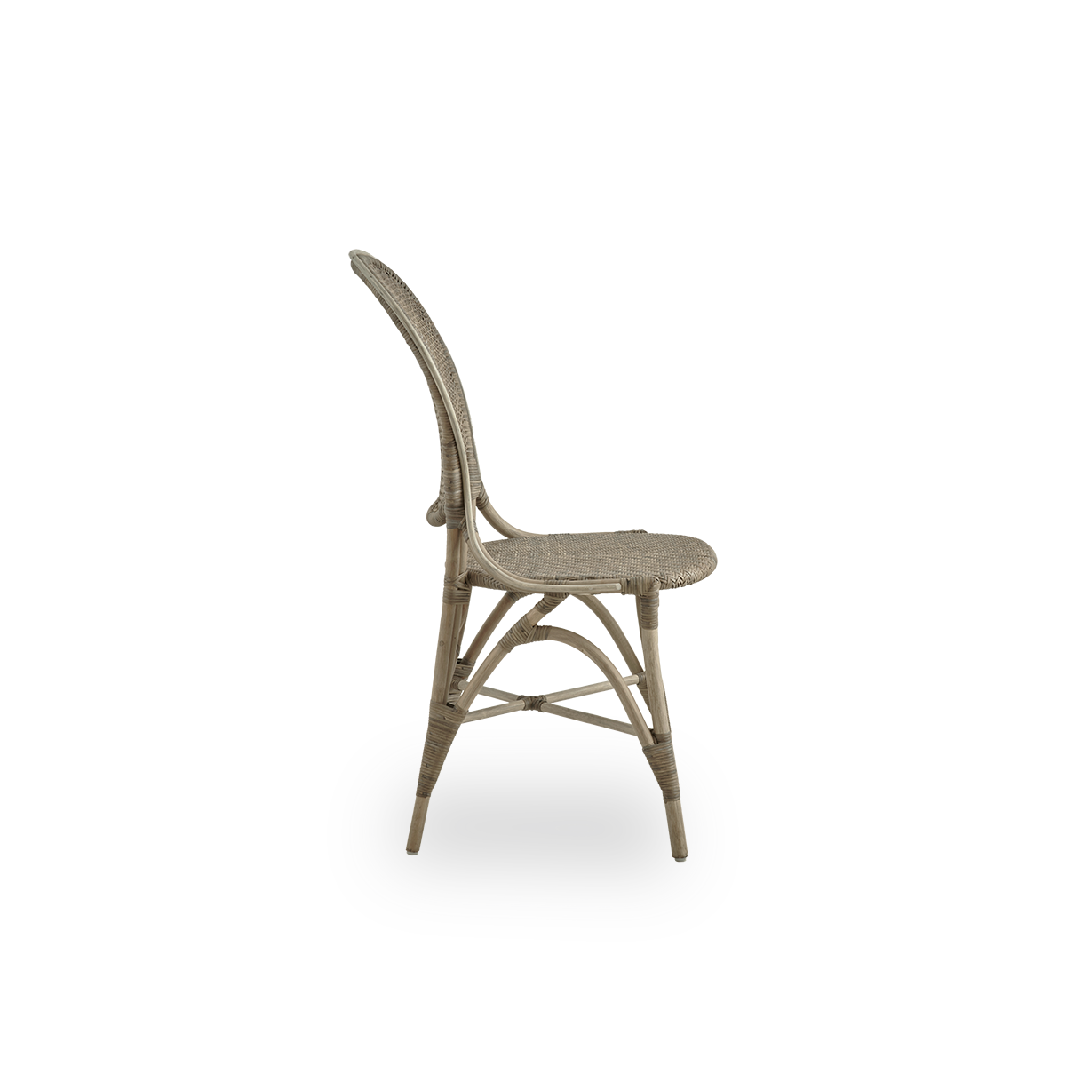 Plain side view of Rossini dining chair in Taupe color. Elegant wicker chair with round backrest in simple design. Handcrafted from high quality rattan.