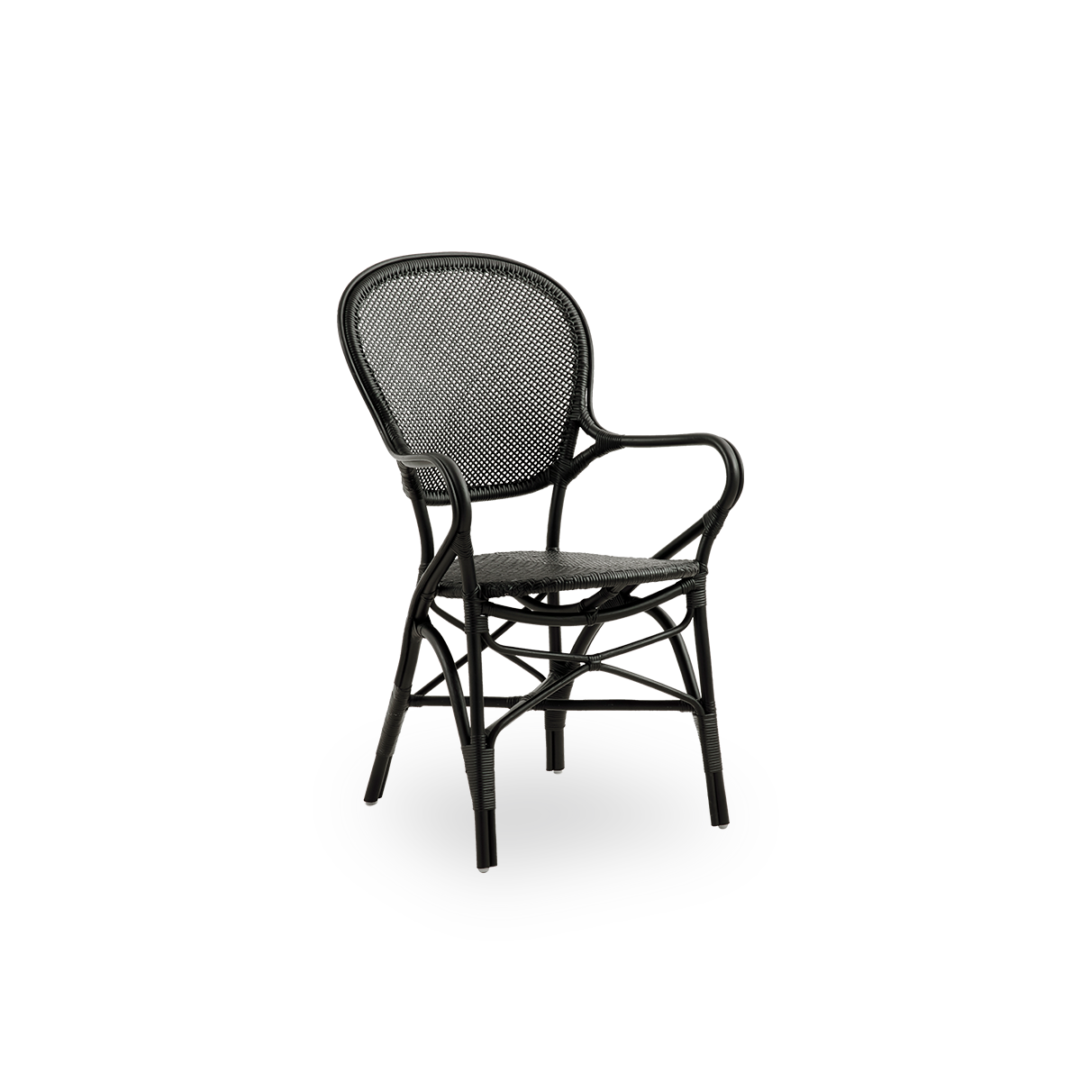 Side view of Rossini dining armchair in black color. Elegant wicker chair with round backrest and armrests in simple design. Handcrafted from high quality rattan.