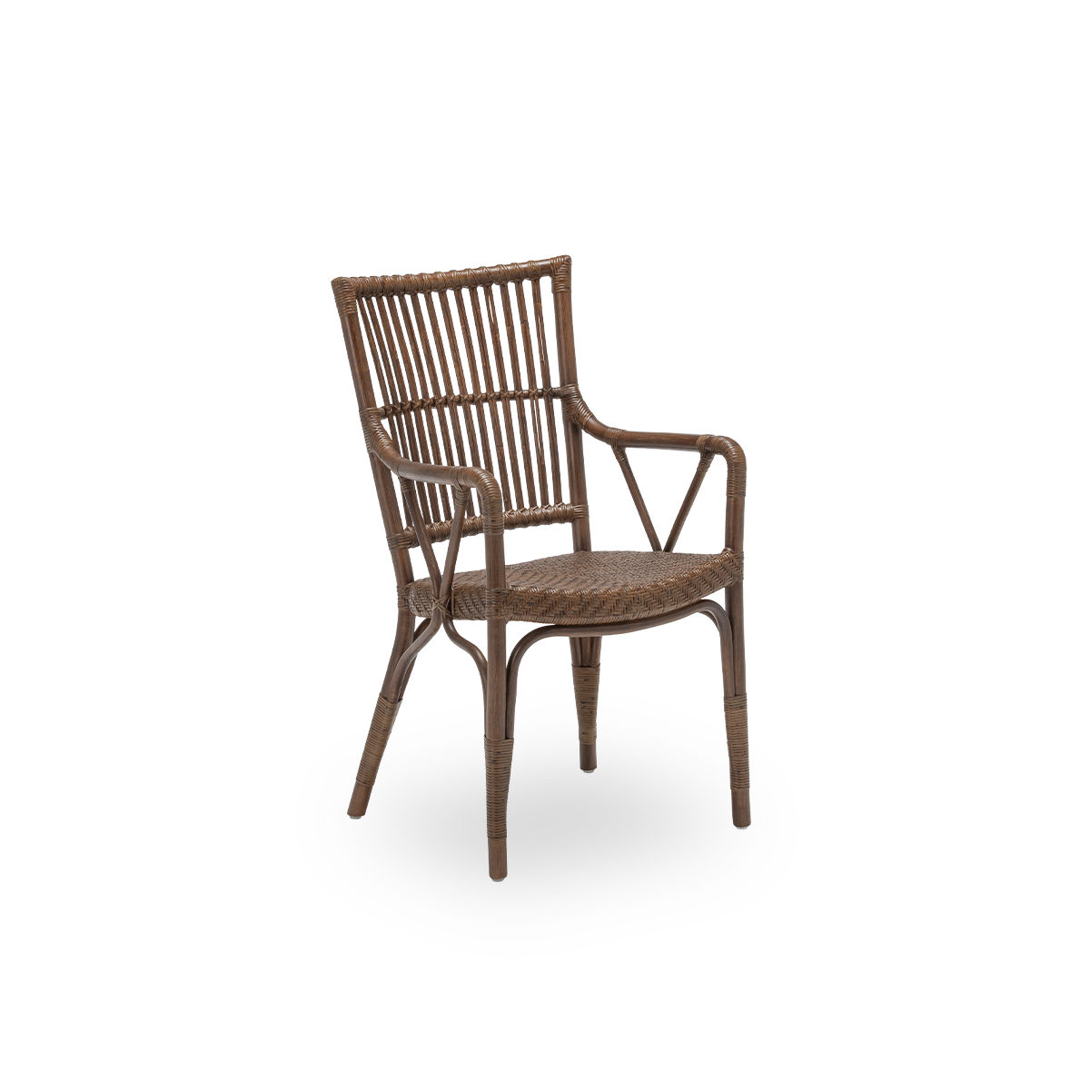 Side view of the Piano dining chair, in brown rattan. Danish design from Sika-Design's Originals collection, where the detailed wicker windings give the chair its character. Handcrafted from high-quality Indonesian rattan.