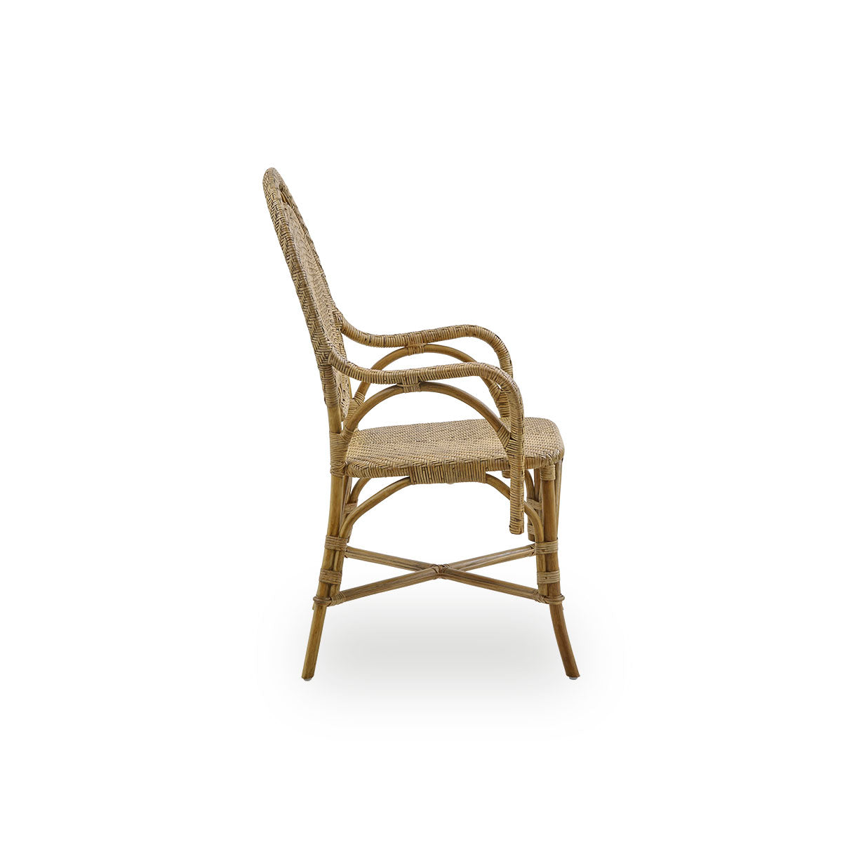 Plain side view of Romantica dining chair in Antique brown color. Elegant, romantic wicker dining chair with round backrest and fully woven seat in charming Danish design. Handcrafted from high-quality Indonesian rattan.