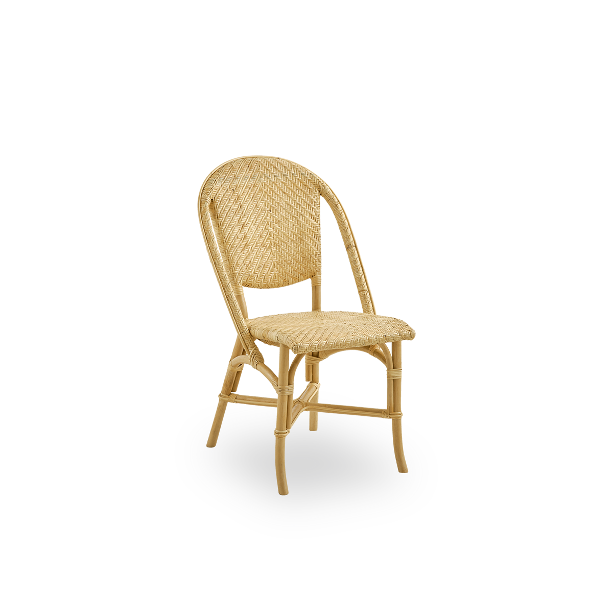 Side view of Alanis dining chair in high quality natural rattan, featuring elegant curves and detailed weaving. 