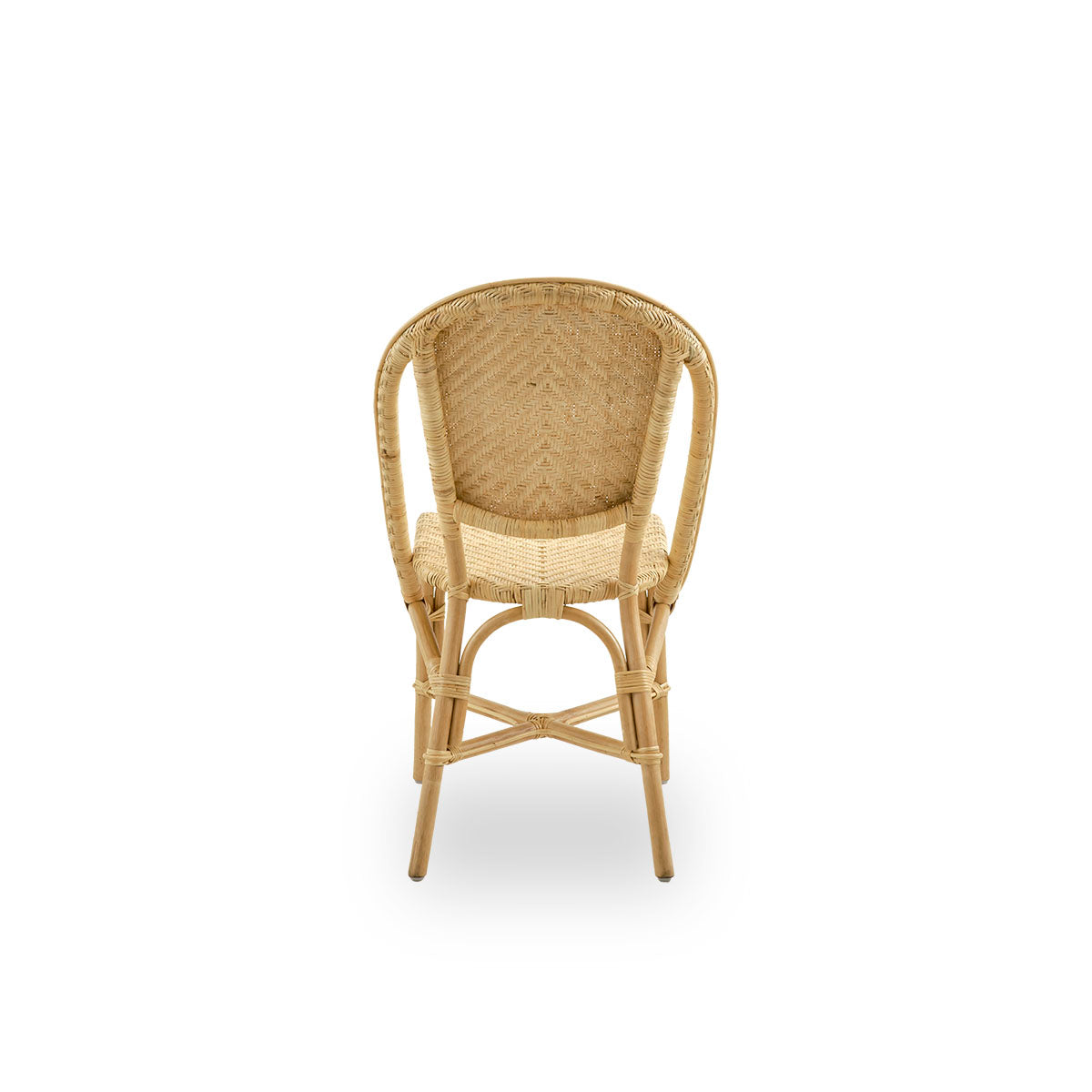 Plain back view of Alanis dining chair in high quality natural rattan, featuring elegant curves and detailed weaving.