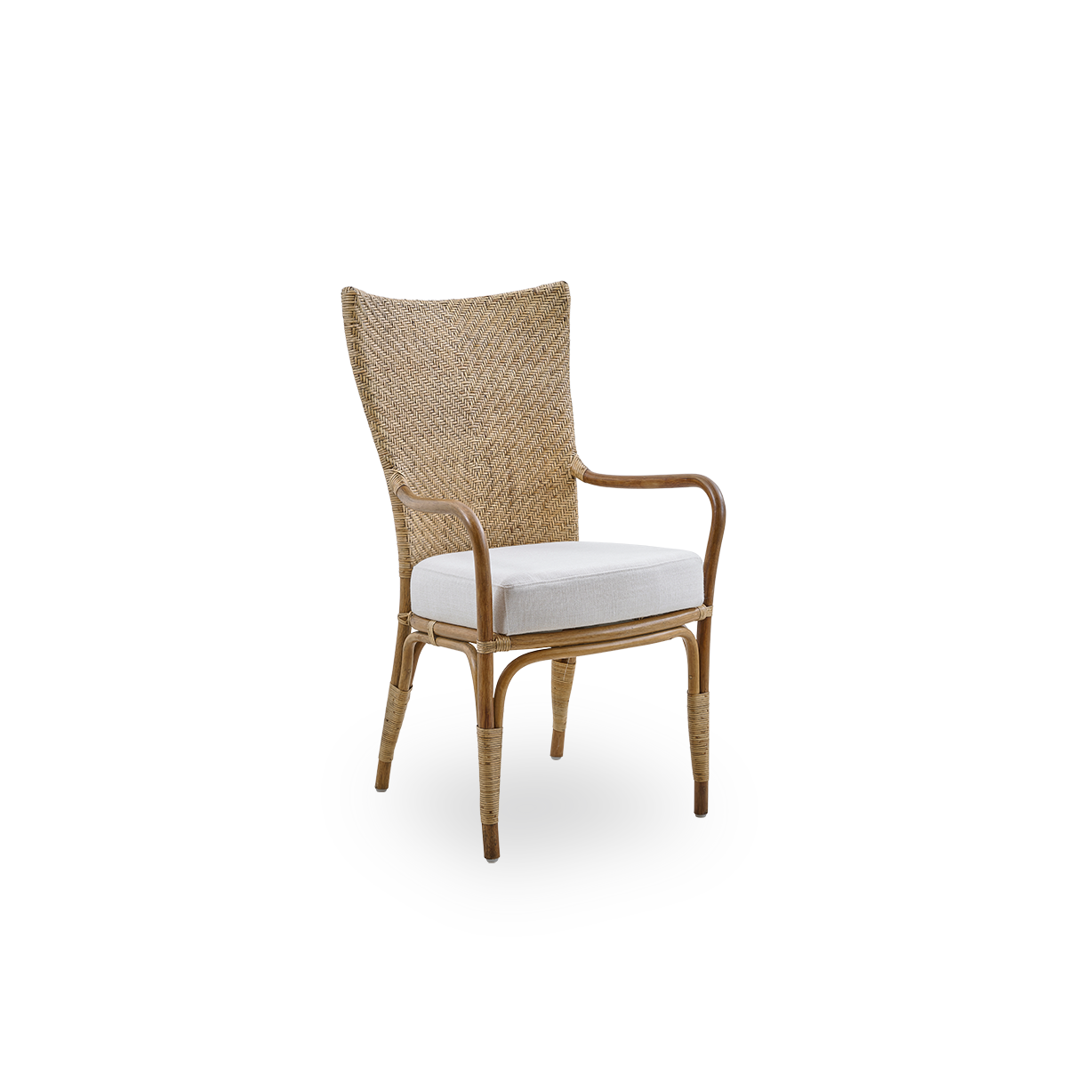Side view of Melody dining armchair in Antique rattan color with high fully woven rattan backrest and upholstery seat.