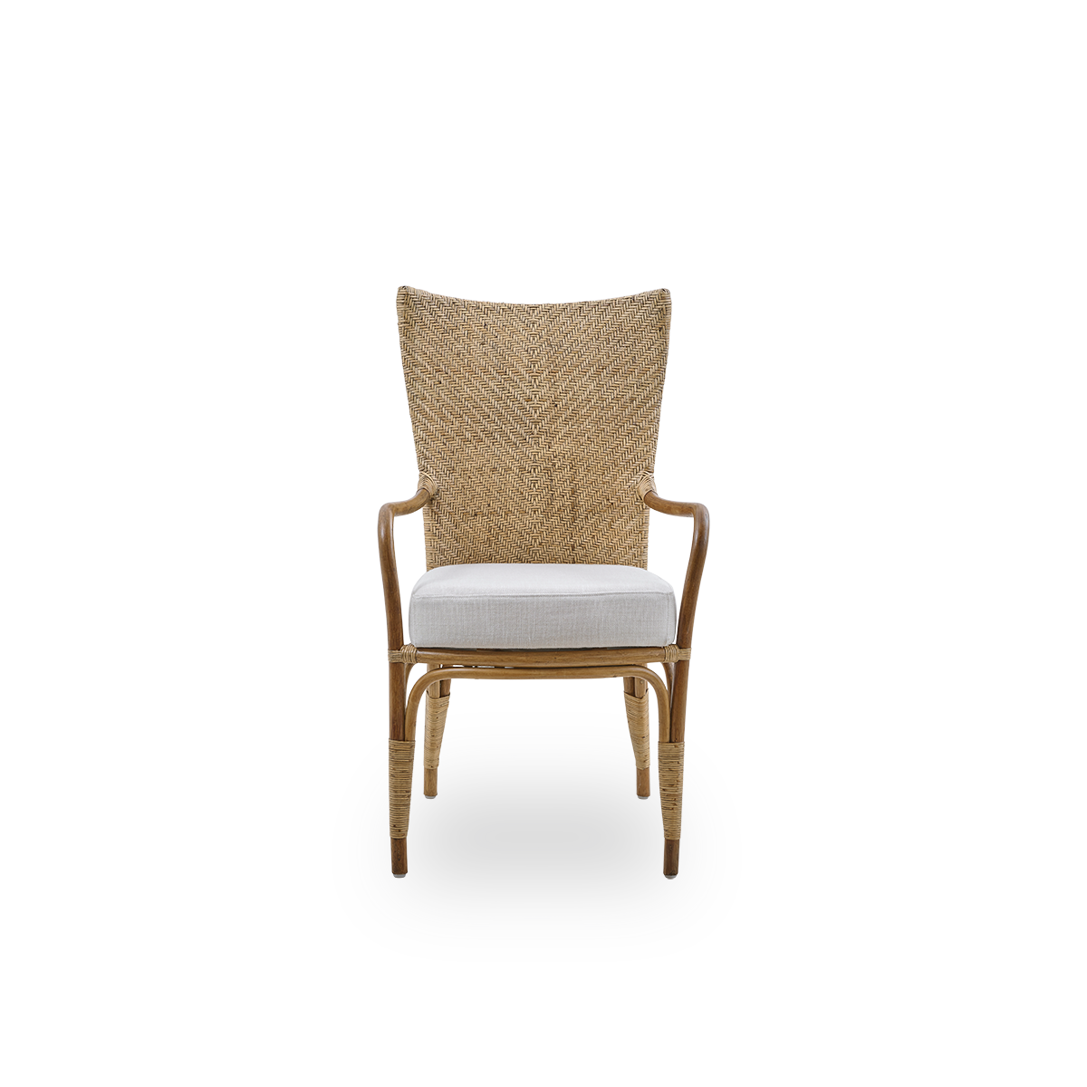 Front view of the Melody dining armchair in antique rattan color with a high fully woven rattan backrest and upholstered seat.