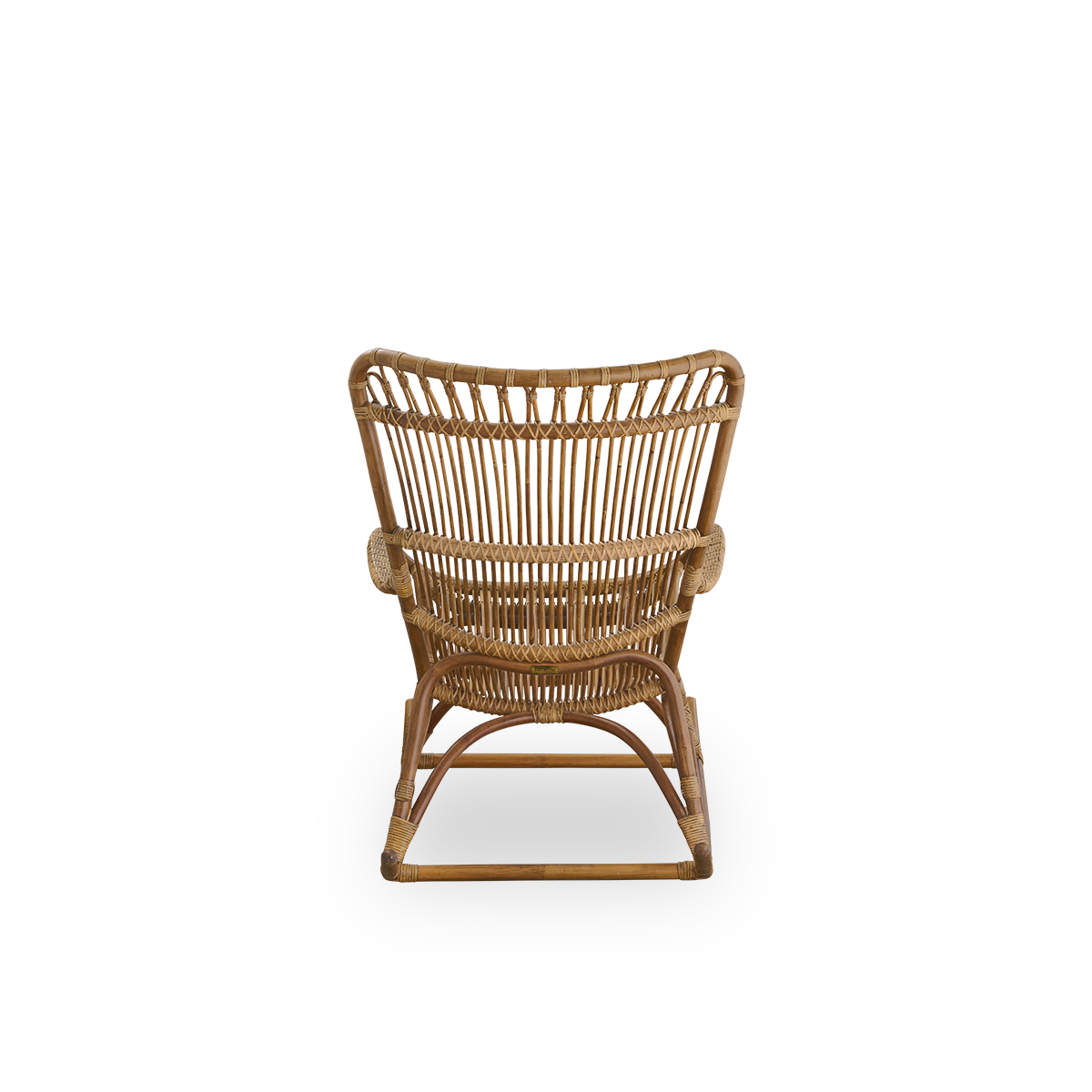 Plain back view of Monet rocking chair with high backrest and armrests presented in Antique brown color. Handcrafted from high-quality Indonesian rattan.