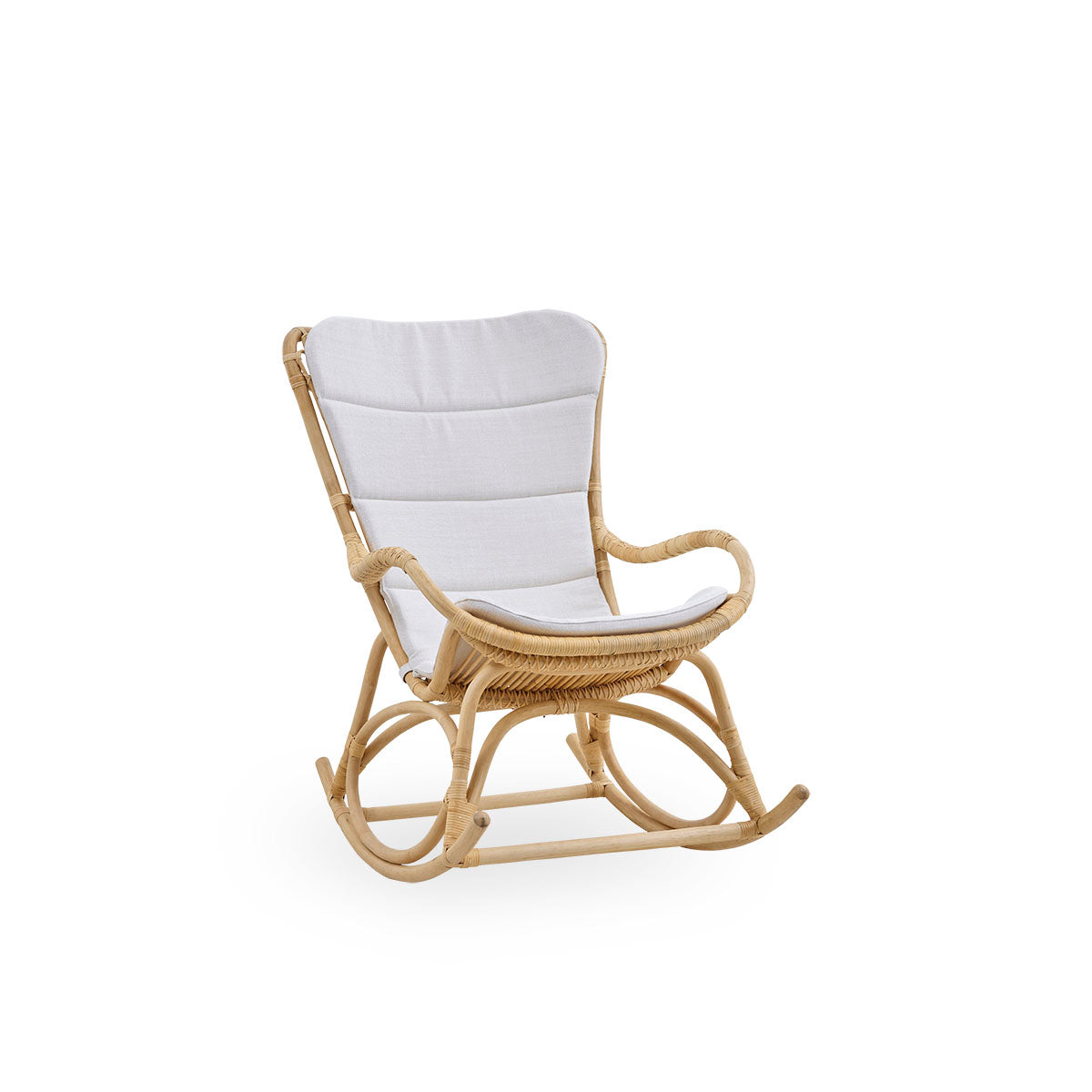 Side view of Monet rocking chair with high backrest and armrests presented in natural rattan. Handcrafted from high-quality Indonesian rattan.