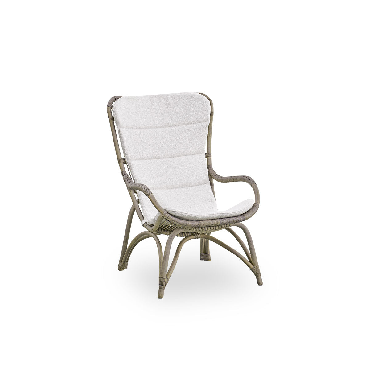 Side view of Monet lounge chair with high backrest and armrests presented in Taupe color. Handcrafted from high-quality Indonesian rattan.