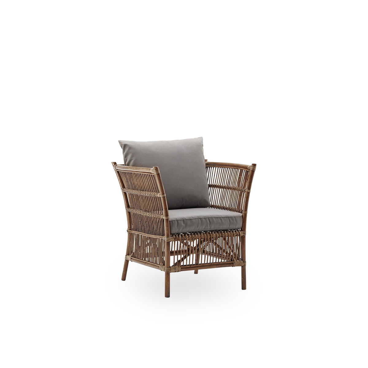 Side view of Donatello wicker lounge chair in Antique brown color. The lounge chair has a boxy design with strict lines handcrafted from high-quality Indonesian rattan.