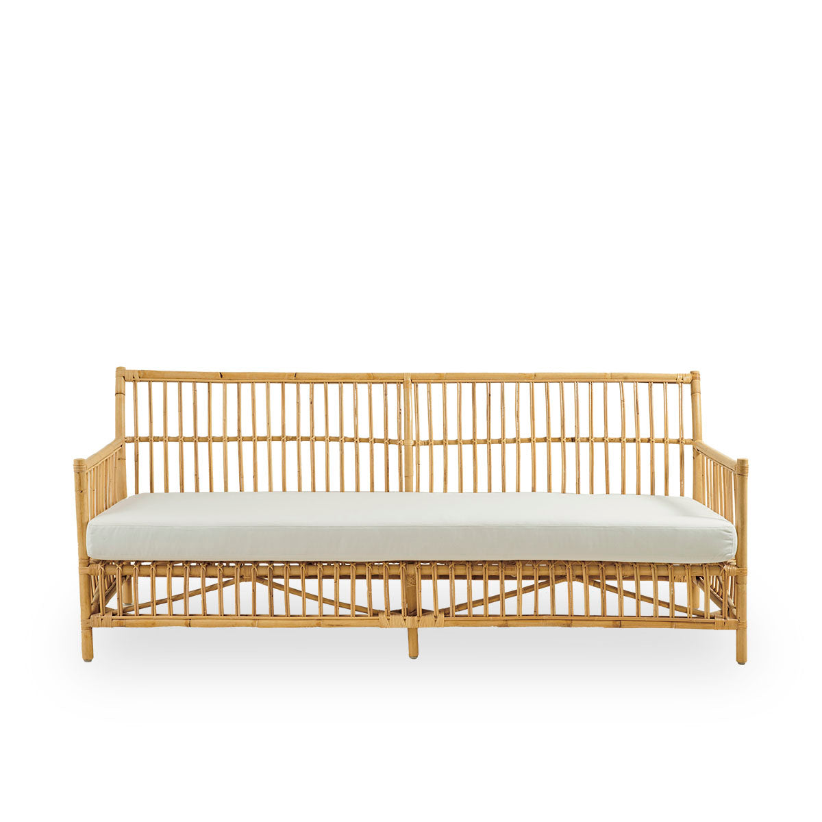 Front view of Caroline 3-seater wicker sofa, simple and elegant Danish design. Handcrafted from Indonesian rattan with detailed woven accents for a cozy, calming presence.