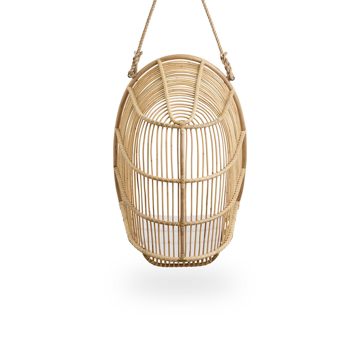 Plain back view of Renoir hanging chair in Natural color handcrafted in high quality rattan. Soft, embracing shape suspended with strong rope.