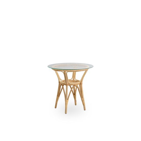 Side view of Tony side table with 8mm tempered glass top. Handcrafted frame in high-quality Indonesian rattan.