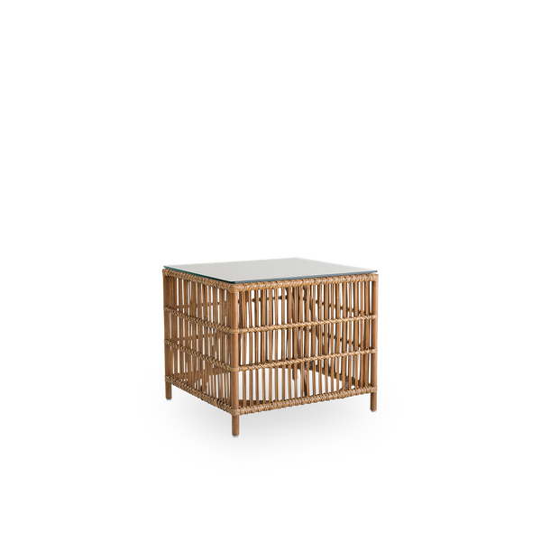 Side view of Donatello wicker side table in Antique brown color. The side table has a boxy design with strict lines handcrafted from high-quality Indonesian rattan.