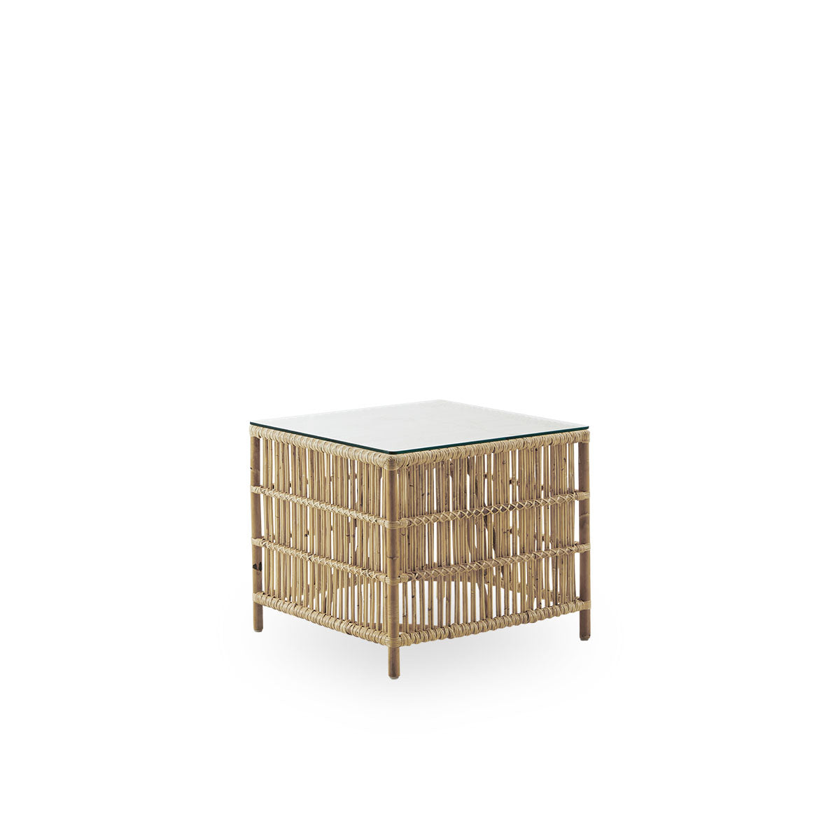 Side view of Donatello wicker side table in natural rattan color. The side table has a boxy design with strict lines handcrafted from high-quality Indonesian rattan.