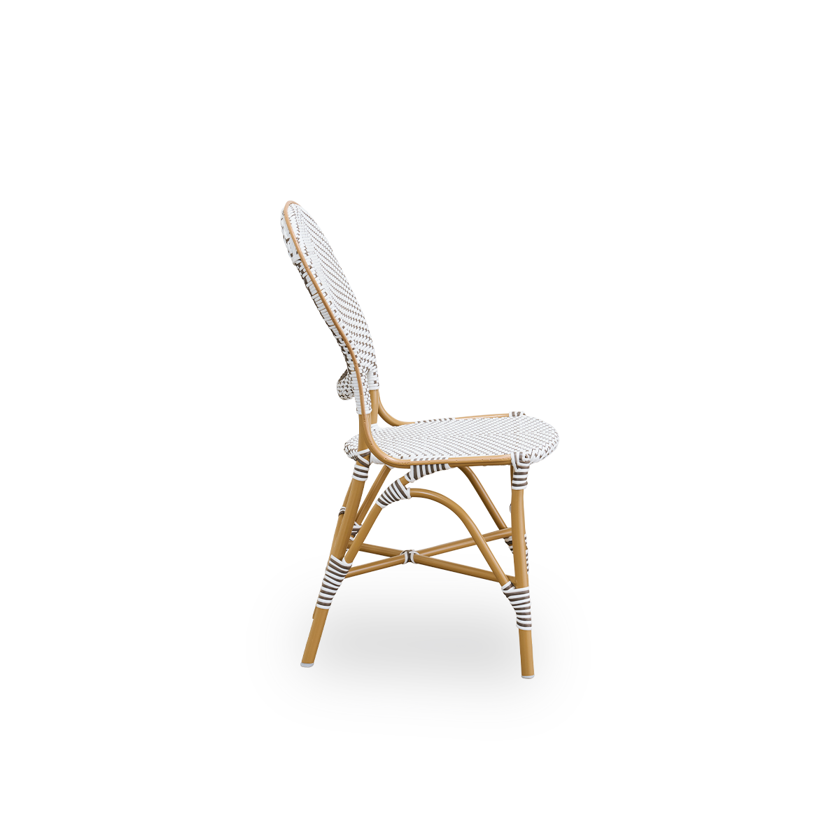 Plain side view of Isabell outdoor dining chair. Almond colored aluminium frame with seat and backrest made in white ArtFibre with brown dots. Inspired by 1950s bistro design.