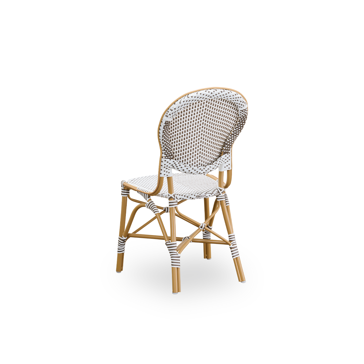 Back side view of the Isabell outdoor dining chair.
Almond-colored aluminum frame with seat and backrest made in white ArtFibre with brown dots. Inspired by 1950s bistro design.