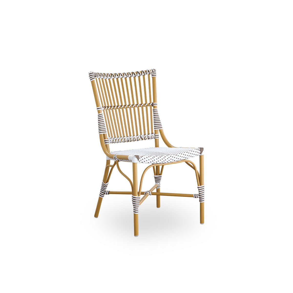 Side view of Monique outdoor dining chair. Aluminium frame in almond color with seat woven with ArtFibre in white with brown dots. Inspired by 1950s bistro design.