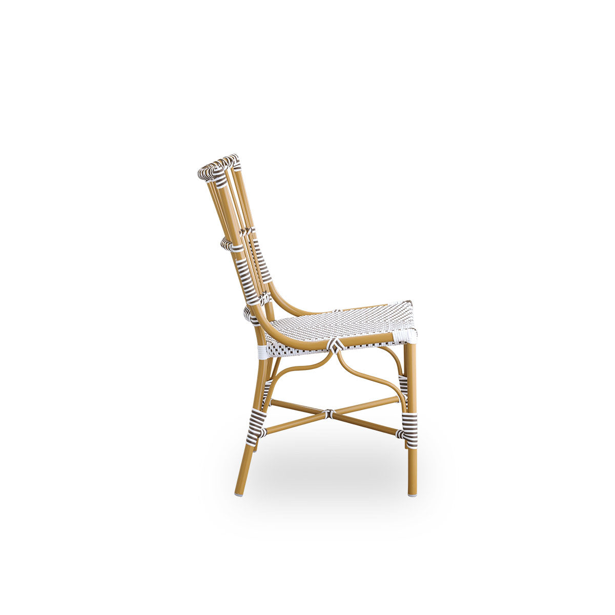 Plain side view of Monique outdoor dining chair. Aluminium frame in almond color with seat woven with ArtFibre in white with brown dots. Inspired by 1950s bistro design.