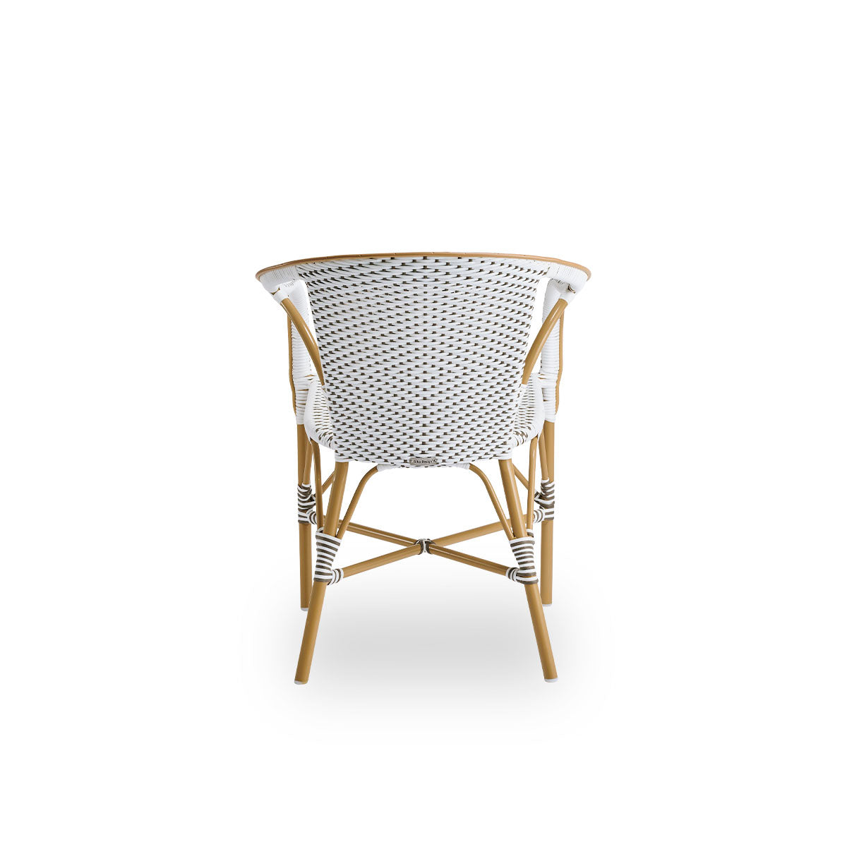 Plain back view of Madeleine outdoor dining armchair. Aluminium frame in almond color with seat and backrest woven with ArtFibre in brown with white dots.