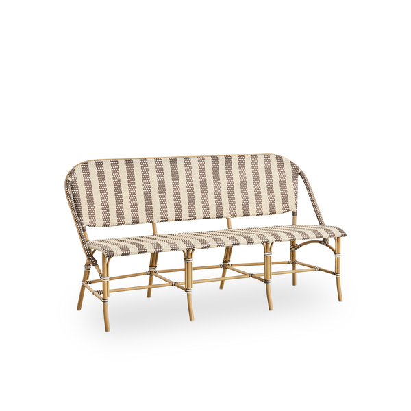 Side view of Sofie outdoor bench inspired by French café style. Rattan frame with fully woven seat- and backrest handcrafted in ArtFibre in broad striped pattern in Ivory and brown. Stackable rattan bistro chair.
