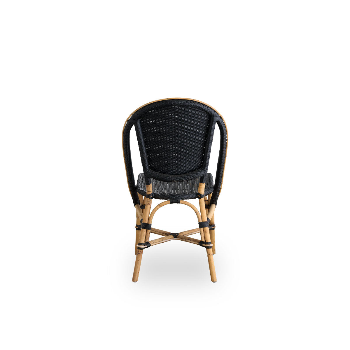 Plain back view of Sofie rattan dining chair inspired by French café style. Rattan frame with fully woven seat and backrest handcrafted in ArtFibre in black color. Stackable rattan bistro chair.