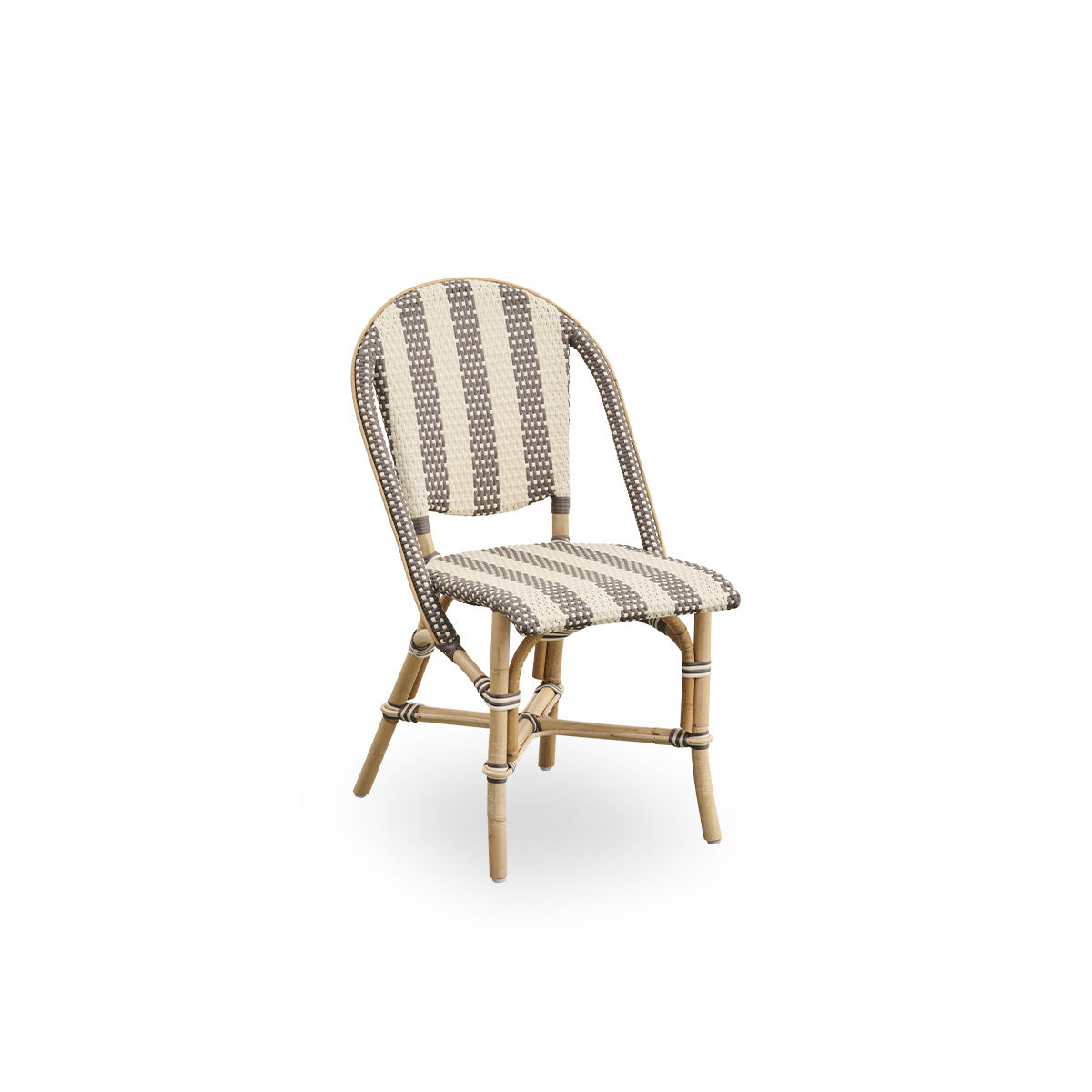 Side view of Sofie rattan dining chair inspired by French café style. Aluminium frame in Almond color with fully woven seat- and backrest handcrafted in ArtFibre in broad striped pattern in Ivory and brown.