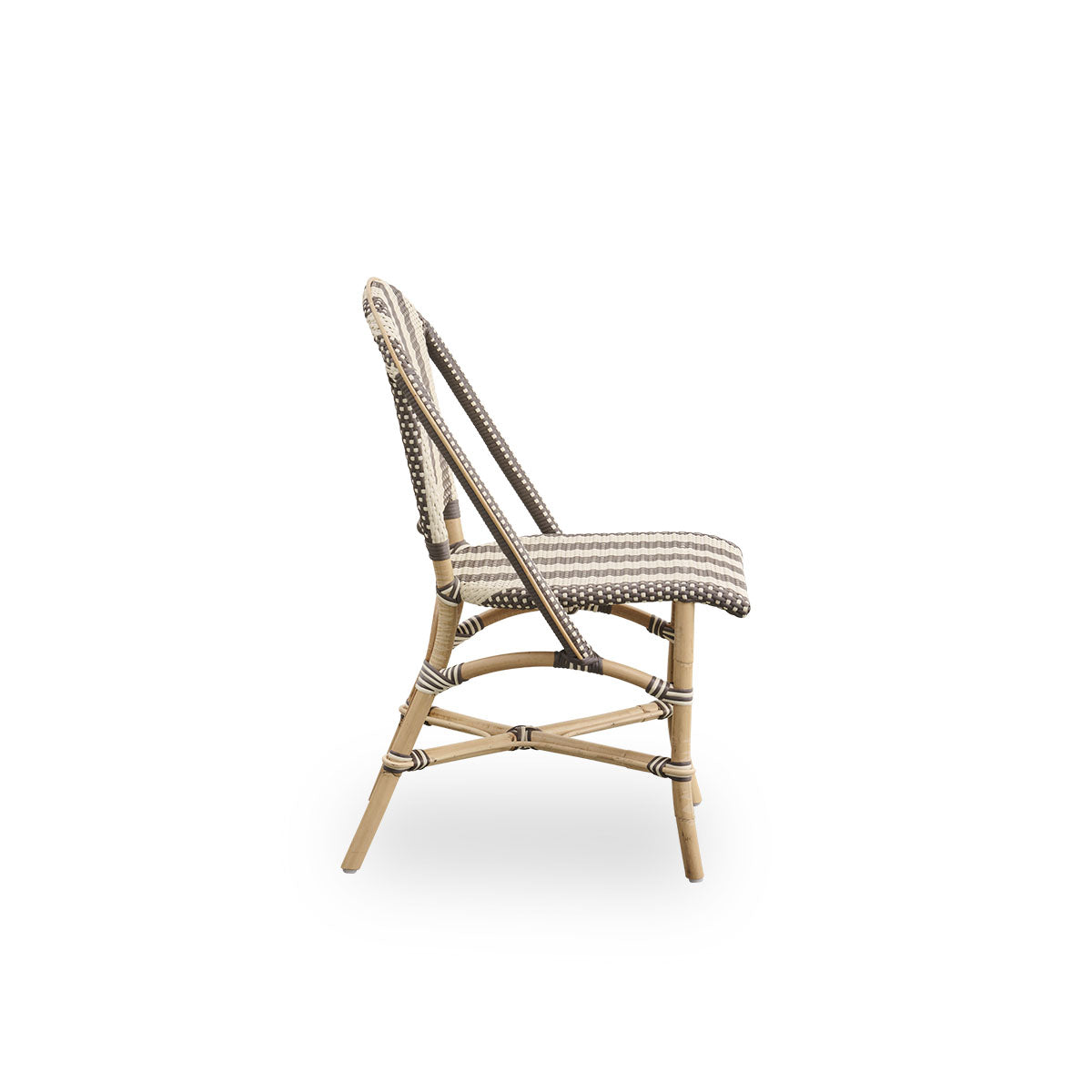 Plain side view of Sofie rattan dining chair inspired by French café style. Aluminium frame in Almond color with fully woven seat- and backrest handcrafted in ArtFibre in broad striped pattern in Ivory and brown.