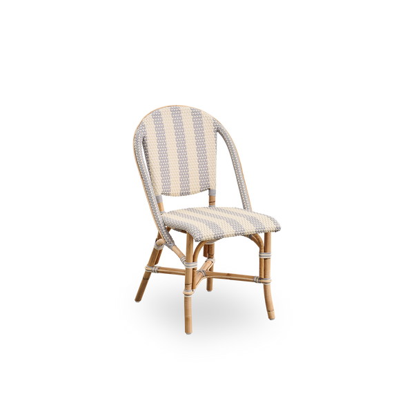 Side view of Sofie rattan dining chair inspired by French café style. Rattan frame with fully woven seat- and backrest handcrafted in ArtFibre in broad striped pattern in Ivory and Grey. Stackable rattan bistro chair.