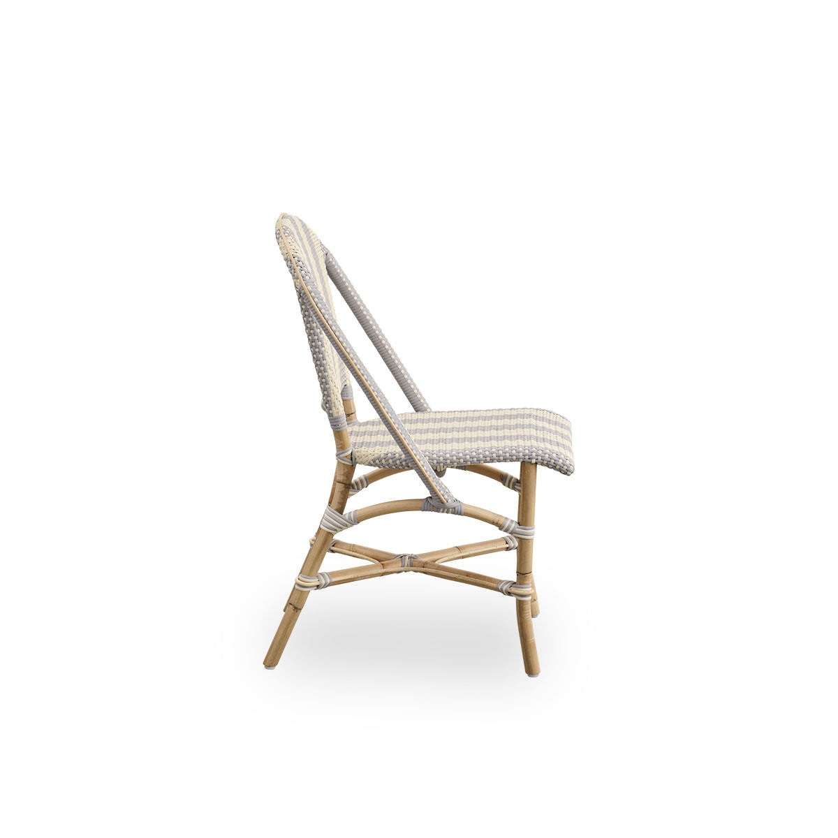 Plain side view of Sofie rattan dining chair inspired by French café style. Rattan frame with fully woven seat- and backrest handcrafted in ArtFibre in broad striped pattern in Ivory and Grey. Stackable rattan bistro chair.