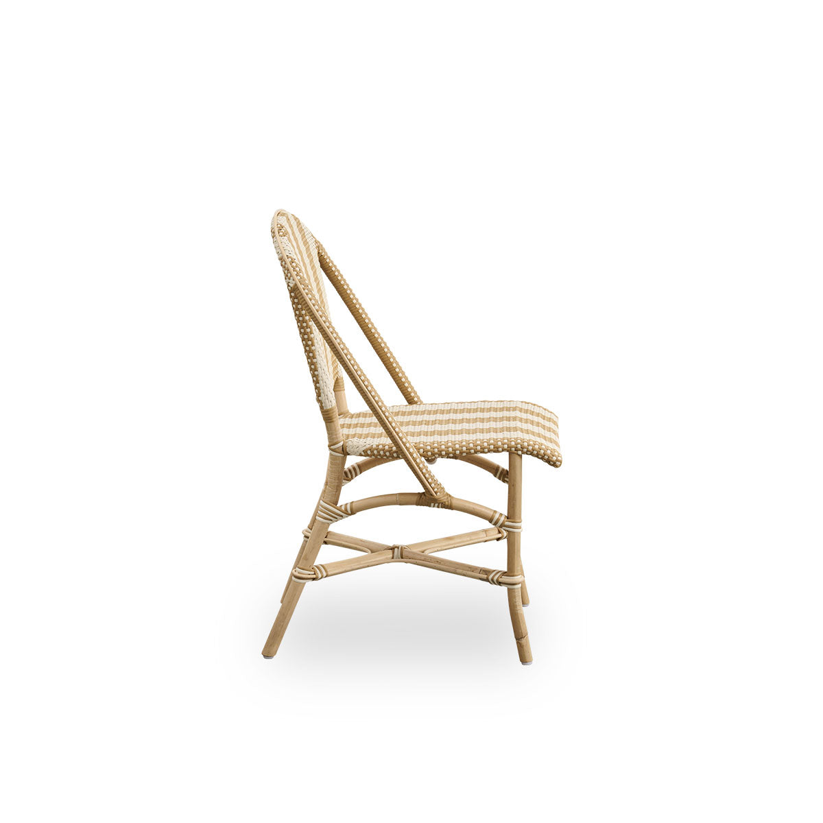 Plain side view of Sofie rattan dining chair inspired by French café style. Rattan frame with fully woven seat- and backrest handcrafted in ArtFibre in broad striped pattern in Ivory and Honey. Stackable rattan bistro chair.