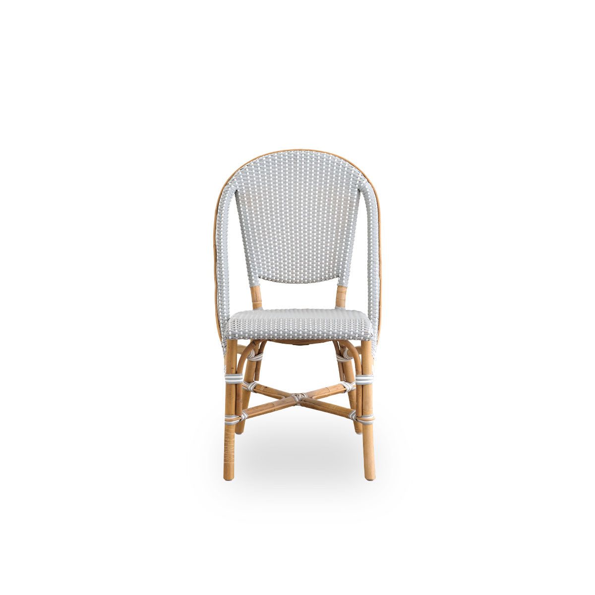 Front view of the Sofie rattan dining chair inspired by French café style.
Rattan frame with fully woven seat and backrest handcrafted in ArtFibre in grey with a white dots pattern. Stackable rattan bistro chair.