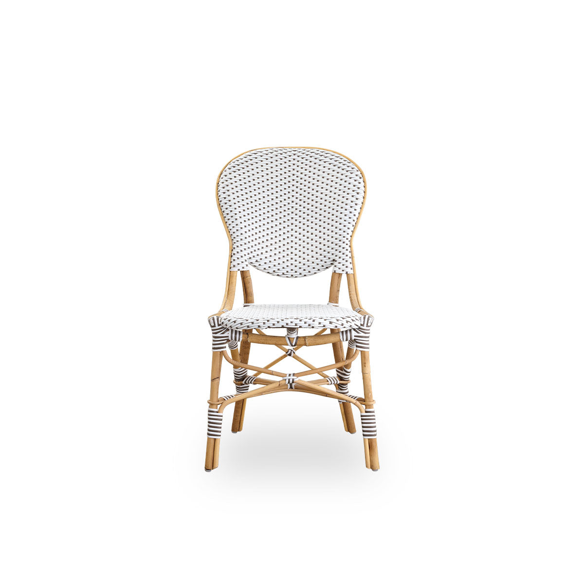 Front view of the Isabell dining chair.
Rattan frame with seat and backrest made in white ArtFibre with brown dots. Inspired by 1950s bistro design.