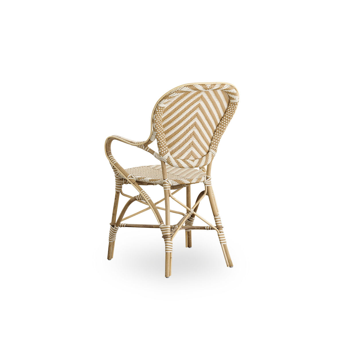 Back side view of the Isabell dining chair with armrests.
Rattan frame with seat and backrest made in ArtFibre in an ivory and grey herringbone pattern. Inspired by 1950s bistro design.