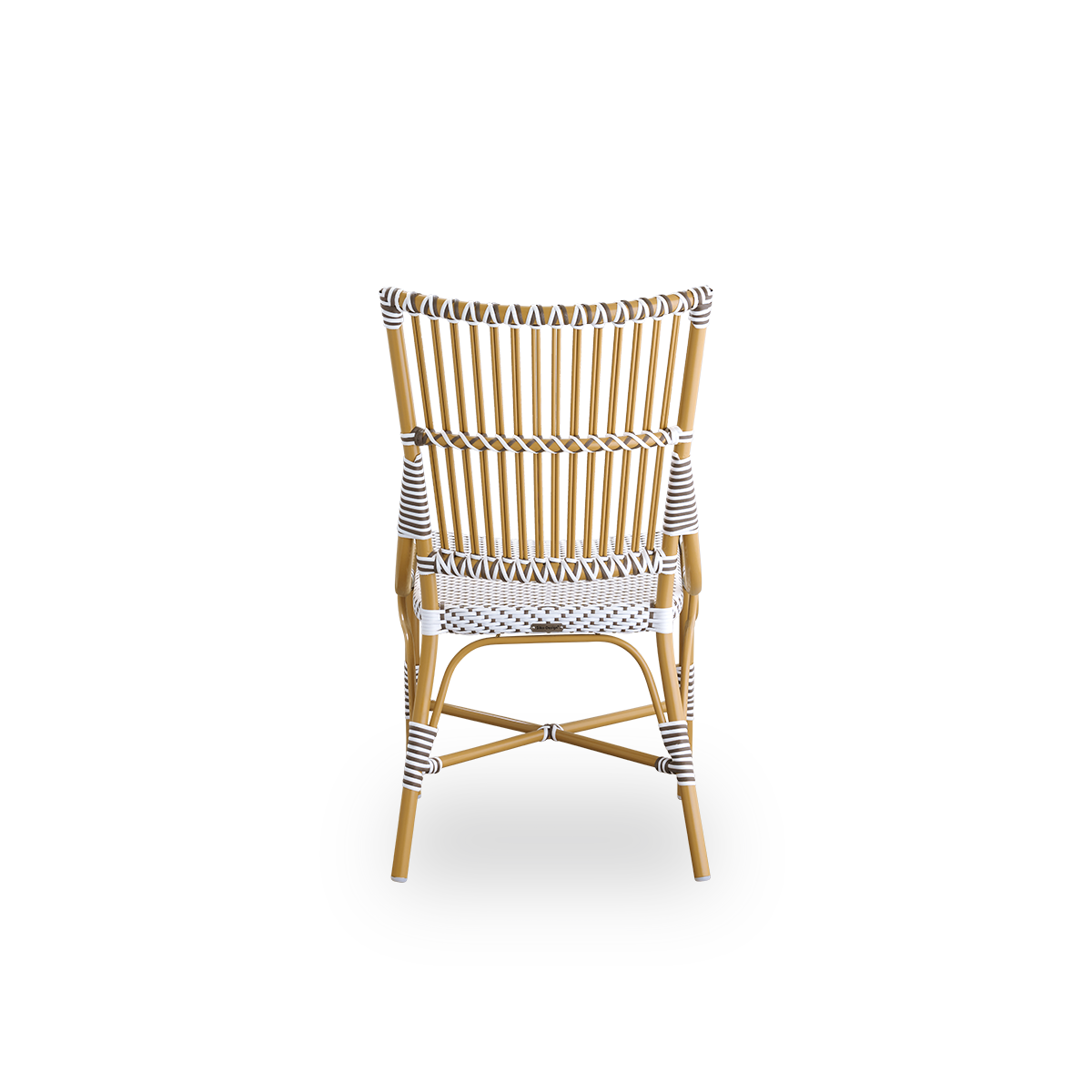 Plain back view of Monique dining chair. Rattan frame with seat woven with ArtFibre in white with brown dots. Inspired by 1950s bistro design.