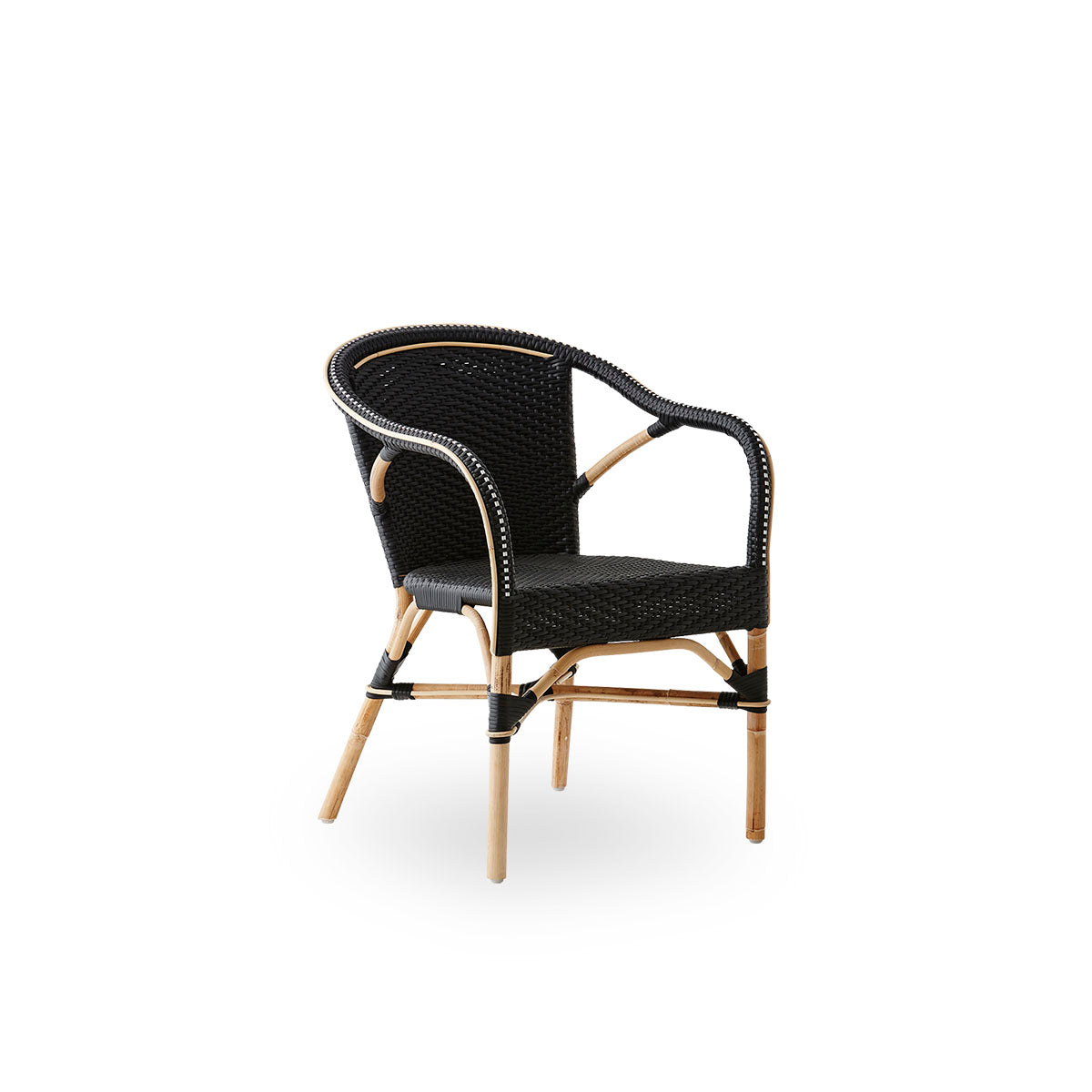 Side view of Madeleine dining armchair. Rattan frame with seat and backrest woven with black ArtFibre. Inspired by 1950s bistro design.