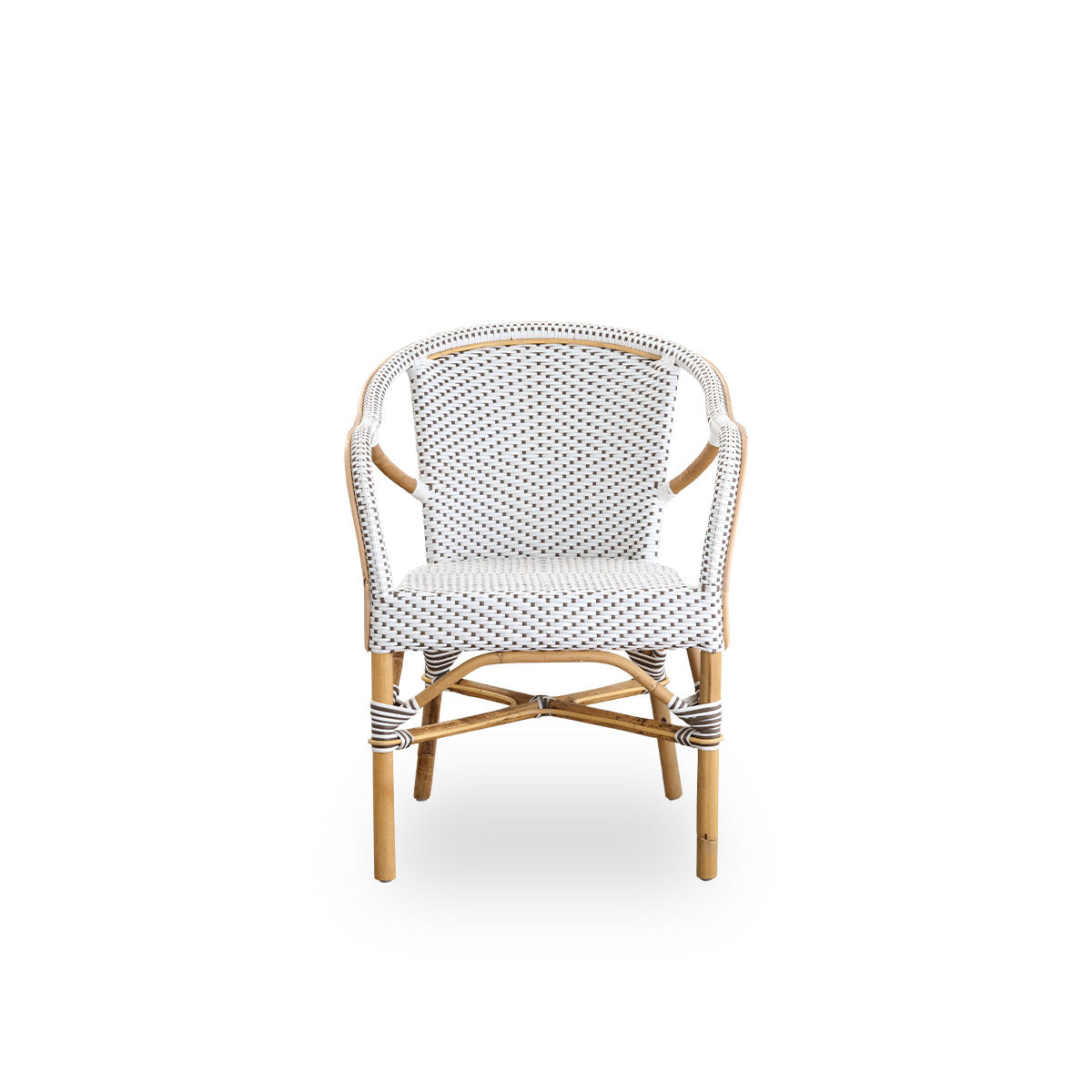 Front view of the Madeleine dining armchair.
Rattan frame with seat and backrest woven with ArtFibre in white with brown dots. Inspired by 1950s bistro design.
