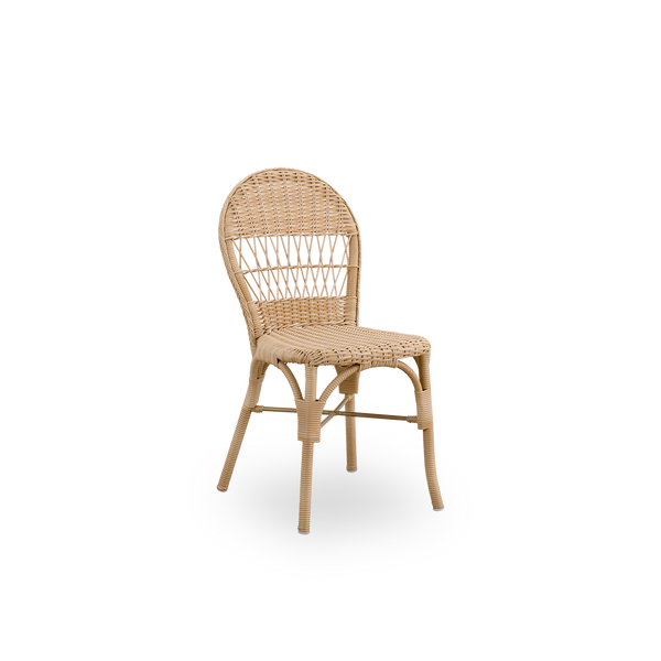 Side view of Ofelia outdoor dining chair in antique Natural color. A smaller dining chair without armrest made of aluminium frame fully woven with ArtFibre.