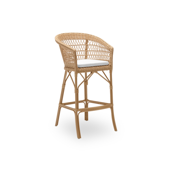 Side view of the Emma exterior bar stool with seat cushion, in natural ArtFibre and aluminium. From Sika-Design's Georgia Garden collection, suited to private homes and to hotels and restaurants alike.