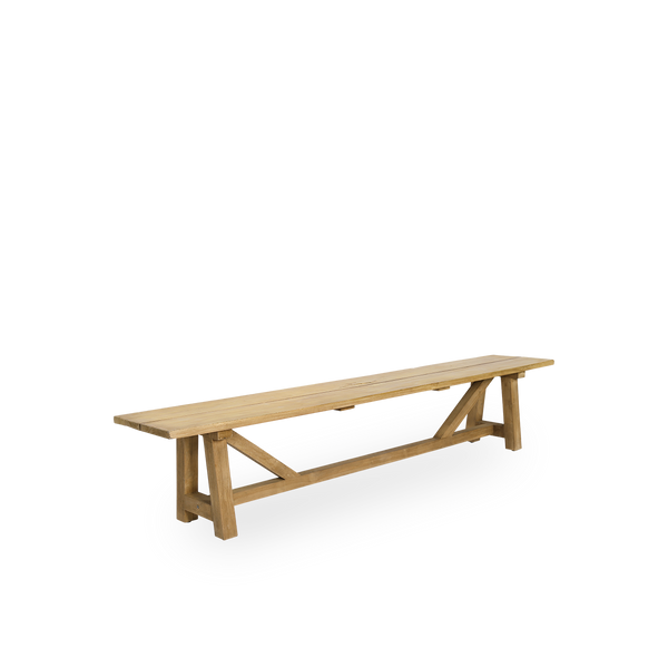 Side view of George outdoor teak bench. The length is 220 cm and fits 4 persons, handcrafted from premium Indonesian teak certified ‘Indonesian Legal Wood’.