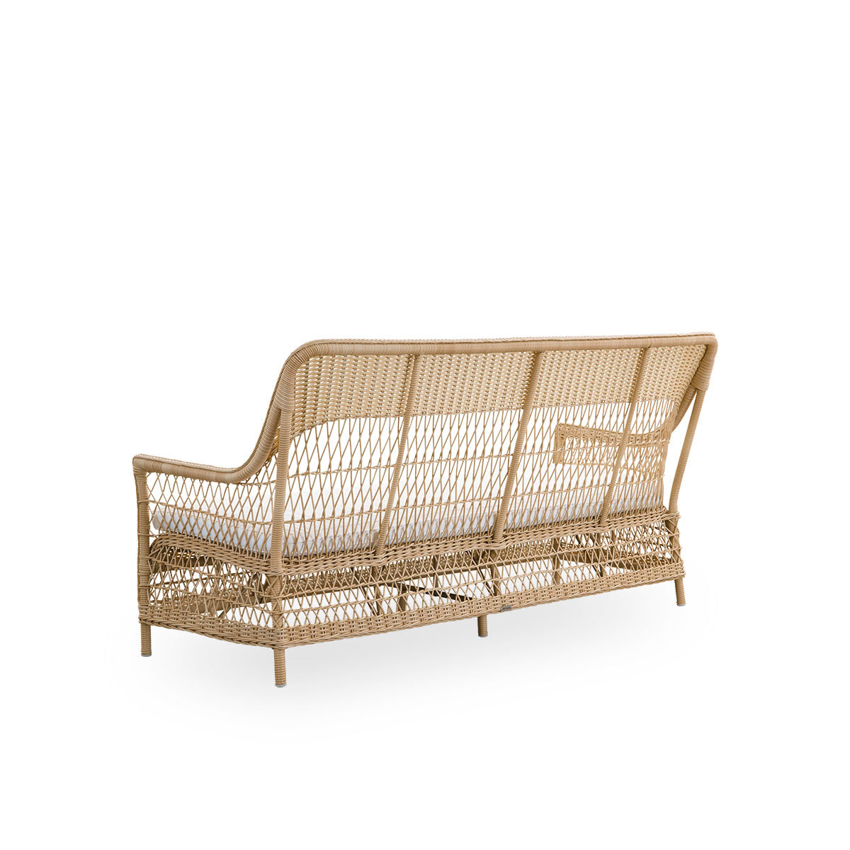 Plain back view of the Dawn outdoor lounge chair in natural color, inspired by British colonial style. Romantic lounge chair with armrest and a high backrest. Fully woven ArtFibre on hand-bent aluminum frame.