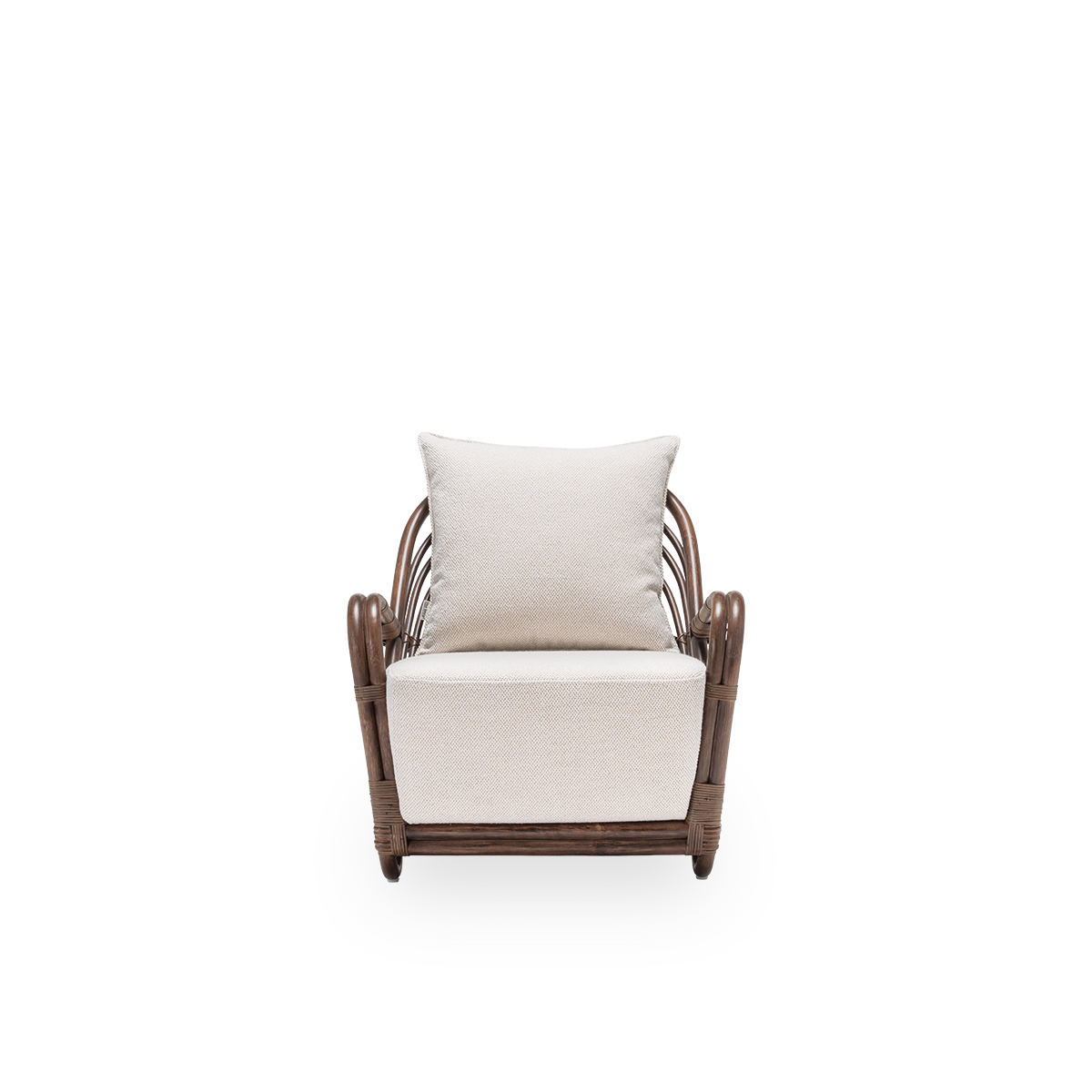 Front view of the Charlottenborg lounge chair with seat and back cushions, in brown rattan. Designed by Arne Jacobsen in 1936 and part of Sika-Design's ICONS collection of reissued designer furniture. Handcrafted from high-quality Indonesian rattan.