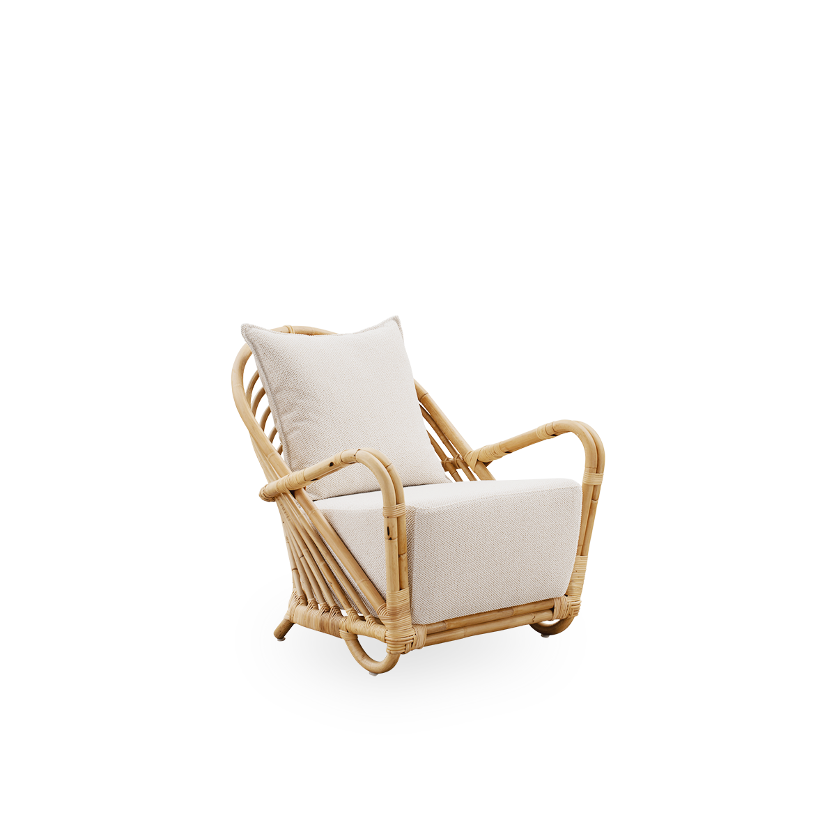 Side view of the Charlottenborg Lounge Chair in polished natural rattan, designed by Arne Jacobsen. The chair features a curved back and armrests integrated into the base, handcrafted from high quality Indonesian rattan.