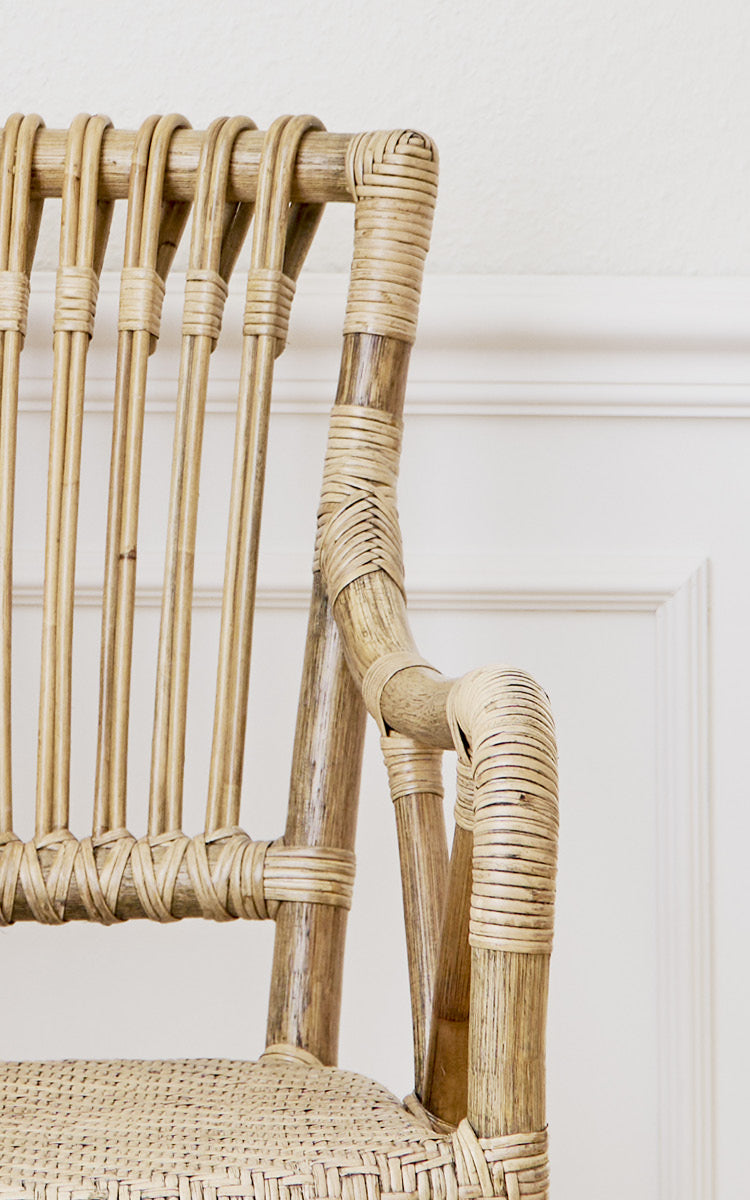 This is a close-up image of Blues Counter Stool in antique Rattan.