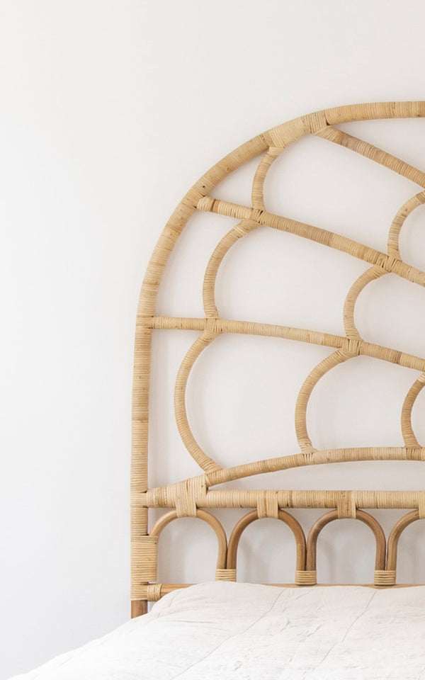 This is a close-up image of Celia Headboard in natural rattan.