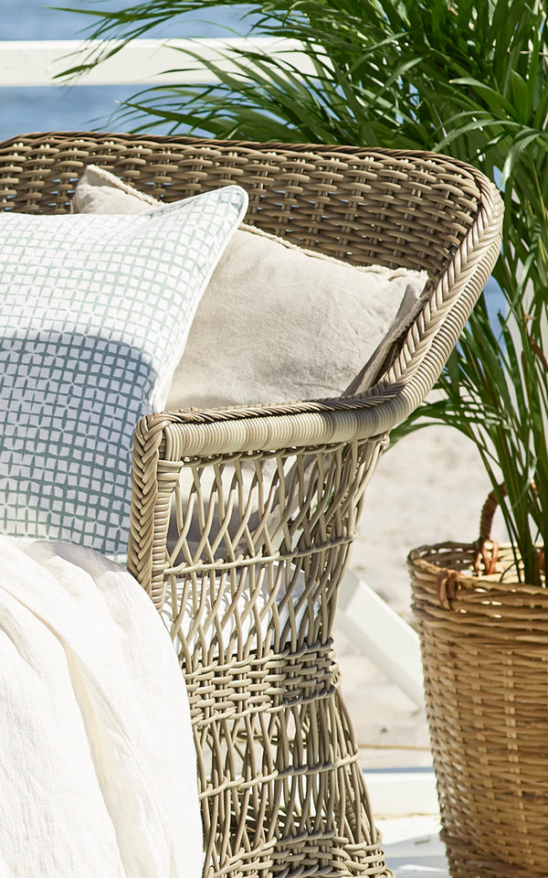This is a close-up image of Olivia Exterior Sunbed in antique grey artfibre aluminium. Detail of the woven ArtFibre side panel.